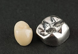 Two dental crowns sitting next to each other