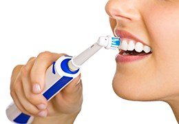 Patient using electric toothbrush