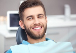 Man sitting back in chair after CBCT scan in Goodlettsville, TN