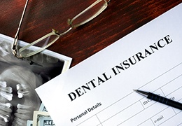 Dental insurance form lying on a table