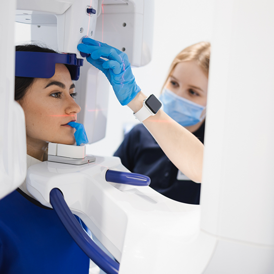Dental patient having a C T cone beam scan taken of their mouth and jaws