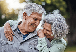 a mature couple smiling with dentures in Goodlettsville