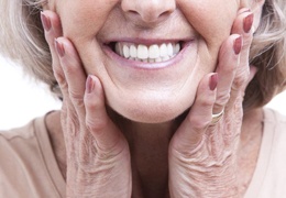 close up of elderly woman smiling with dentures in Goodlettsville