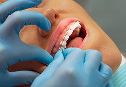 Patient receiving dental treatment