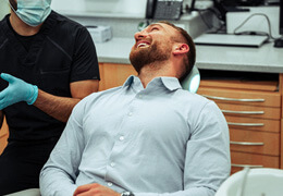 a patient chatting with their dentist