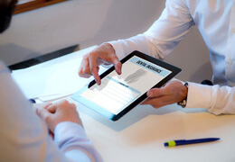 a patient reviewing a dental insurance form