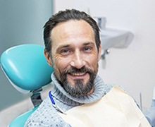 man sitting in the dental chair