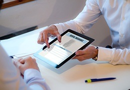 Dental insurance information on tablet computer