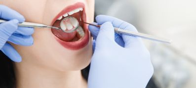 Woman getting a dental exam